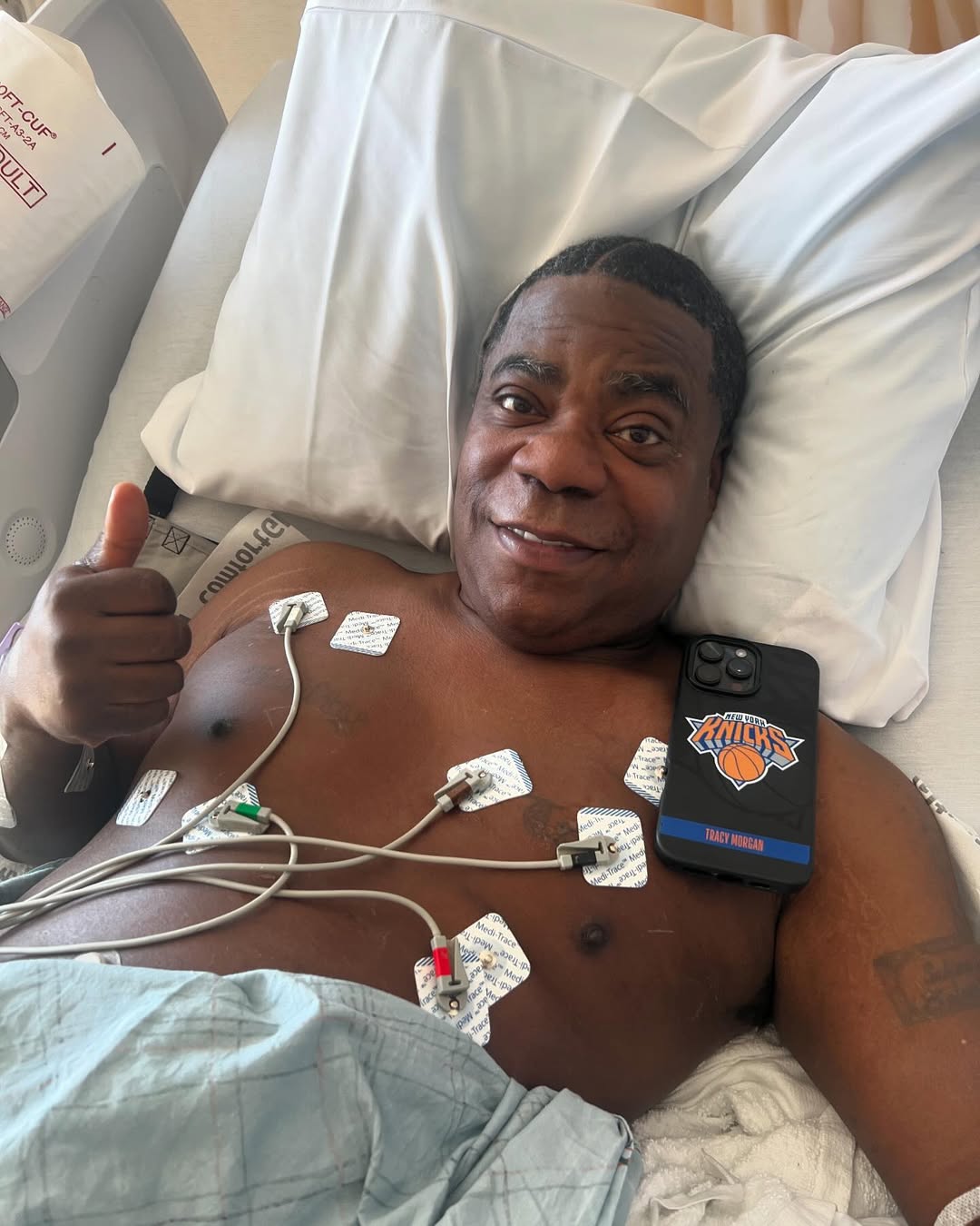 Tracy Morgan's Health Update: After throwing up at the Knicks game and being hospitalized, he assures fans he's feeling better, attributing the incident to food poisoning.