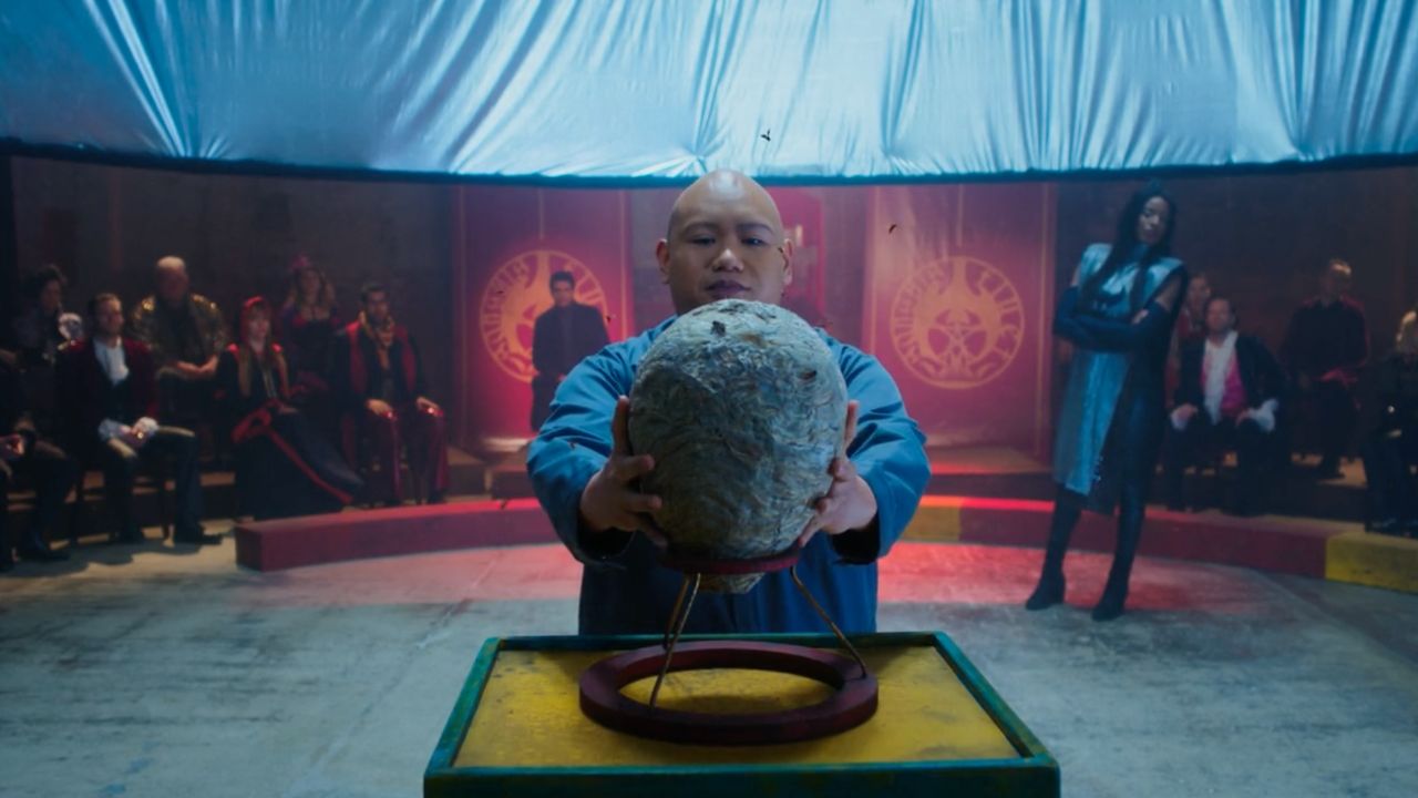 Jacob Batalon holds a beehive.